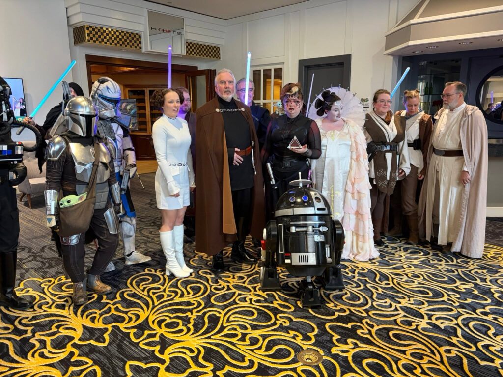 A group of nicely dressed Star Wars characters